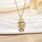 Gold cartoon character pendant necklace with enamel details on a white background, Shopimist fashion jewelry