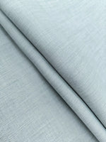 Close-up of light grey fashion fabric texture, ideal for apparel at Shopimist