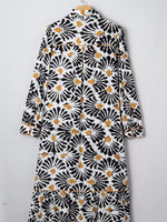 Long sleeve maxi dress with black and gold abstract floral print on white background, Shopimist fashion
