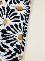 Black and brown abstract print fabric detail from Shopimist trendy fashion apparel