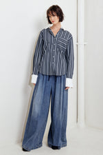 BEHIND THE GRIN WOVEN TOP