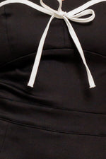 NOIR BOW COUTURE WOVEN SKORT ROMPER