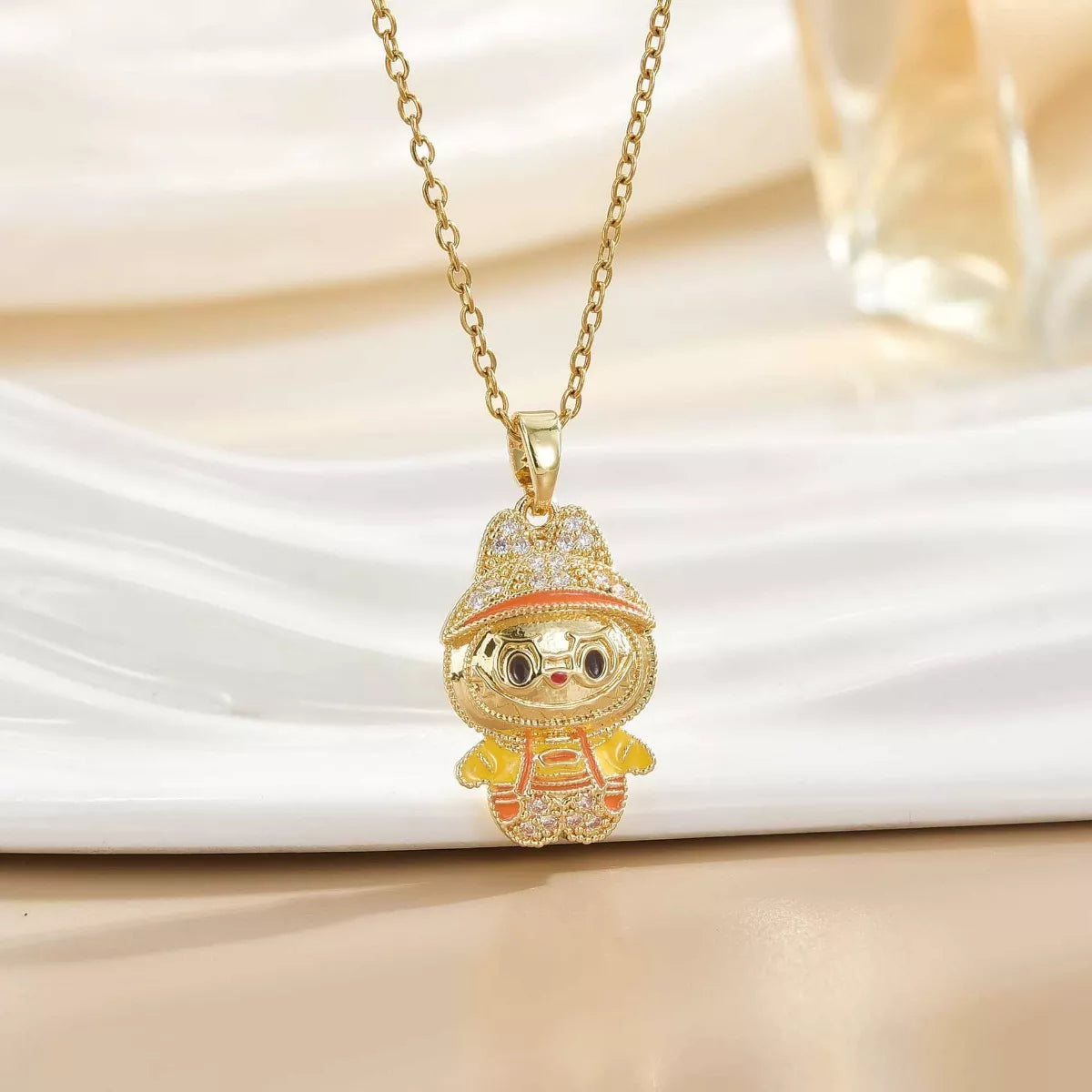 Gold cartoon pendant necklace with sparkling details, trendy fashion jewelry from Shopimist