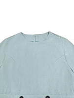 Light blue women's fashion dress with round neckline, available at Shopimist