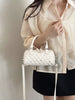 Quilted Barrel Handbag test
