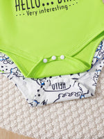 Close-up of neon green and white baby bodysuits with snaps, trendy family fashion at Shopimist
