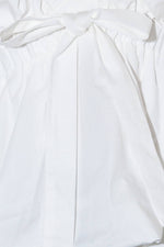 SLOW DOWN IN WHITE WOVEN TOP