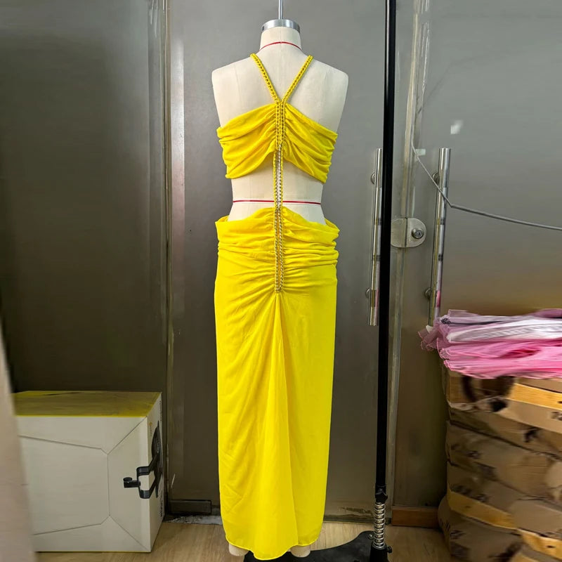 2025 women's backless sexy beach vacation dress with suspender collar pleated metal chain, new elegant vacation dress design